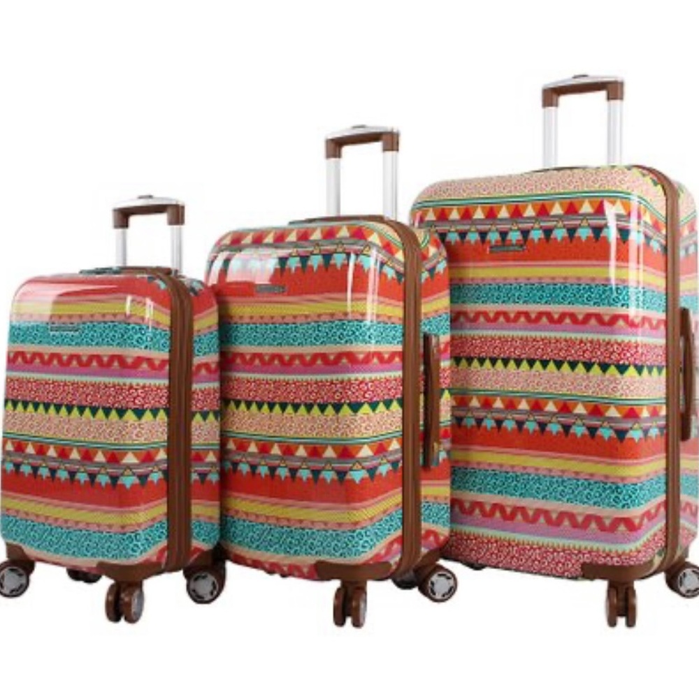 Lily Bloom 4 piece luggage set with with 1 duffle bag. 3 Hardshell luggage